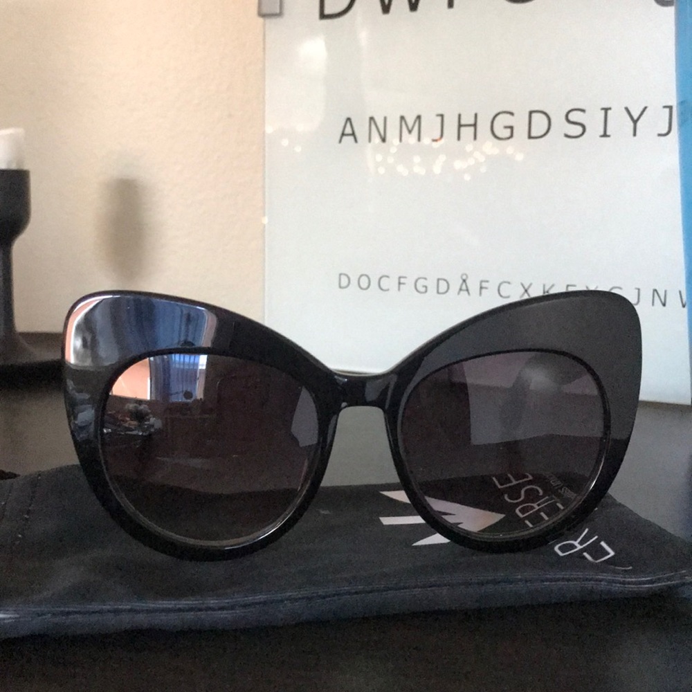 Large rimmed cat eye Sunglasses